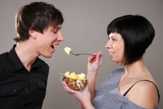 Eating pineapple