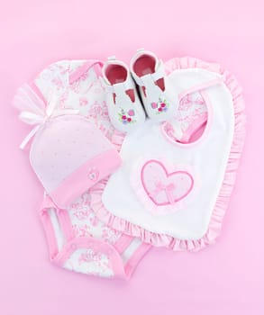 Pink infant girl clothing for baby shower