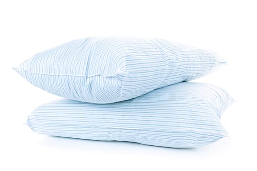 Two soft pillows with blue striped covers isolated on white background
