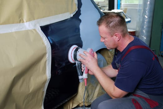 Sanding off the paint