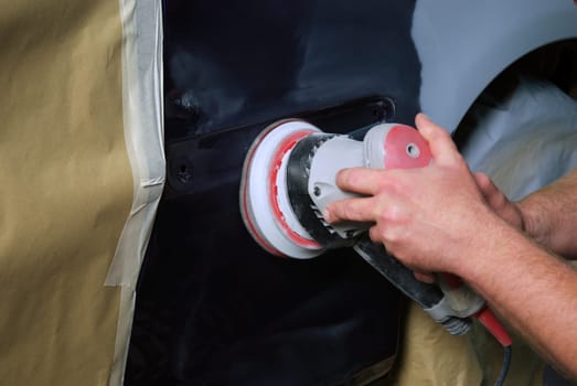 Sanding off the paint