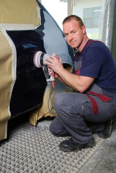 Sanding off the paint