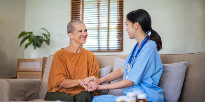 Empathy, trust and nurse caregiver holding hands with patient. consulting support and healthcare advice. Kindness, counseling and medical therapy in nursing home for hope, consultation and psychology.