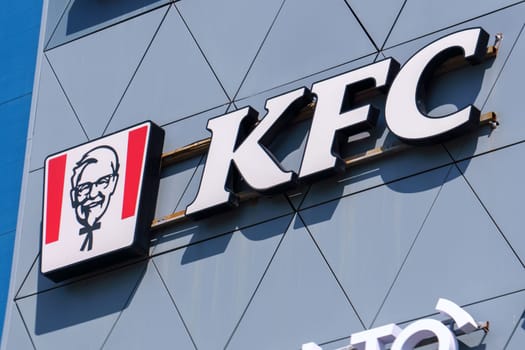 Tyumen, Russia-August 09, 2023: KFC logo restaurant. KFC is popular fast food chain known as Kentucky Fried Chicken