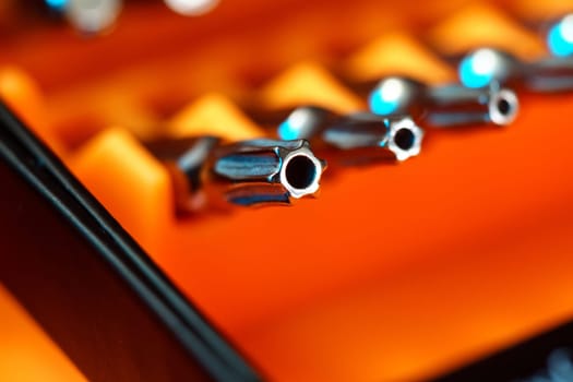 Set of heads for screwdriver bits. Tools collection, close up, selective focus.