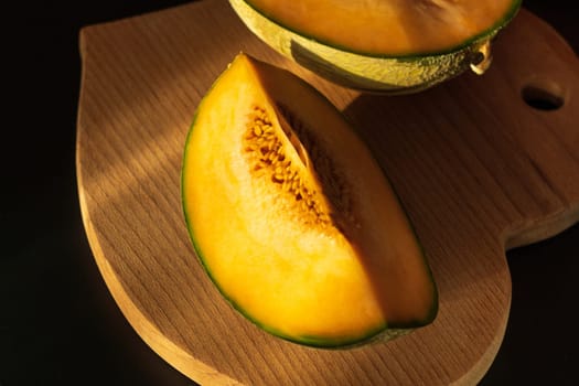 Piece of melon, close up of a table. How to peel and seed melon, close up process