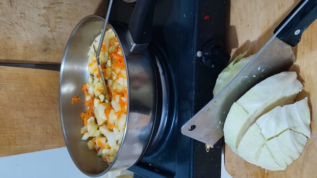 white cabbage and red bell pepper cut for salad or soup, food fresh vegetables. High quality photo