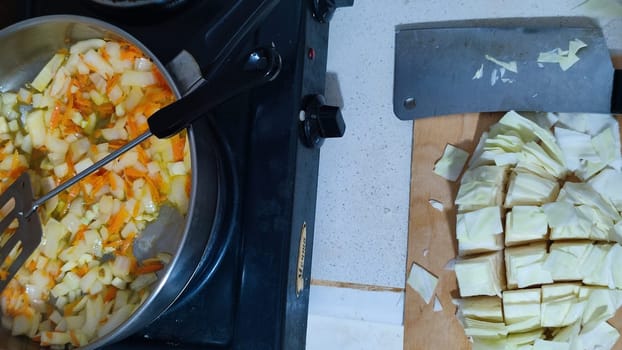 white cabbage and red bell pepper cut for salad or soup, food fresh vegetables. High quality photo