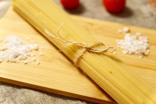 Spaghetti Pasta. Uncooked Italian Pasta Golden Rotating Backdrop. Healthy Eating Concept.