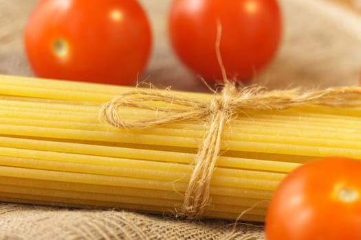 Spaghetti Pasta. Uncooked Italian Pasta Golden Rotating Backdrop. Healthy Eating Concept.