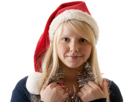 A beautiful young blonde in a Santa hat on a white background