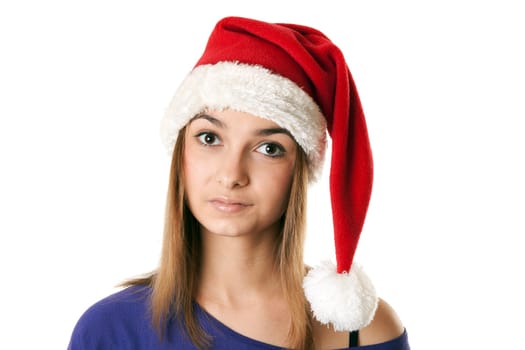 Beautiful girl in red Santa hat on a white background