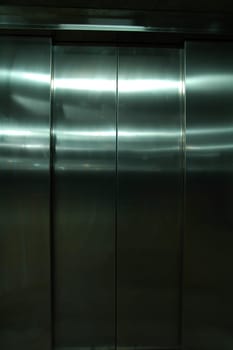 closed doors of stainless steel elevator