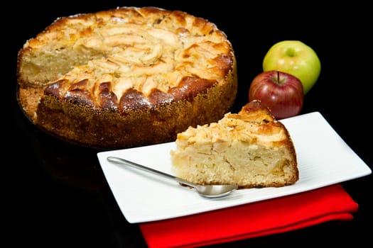 Apple Tart  with fresh apple on black background