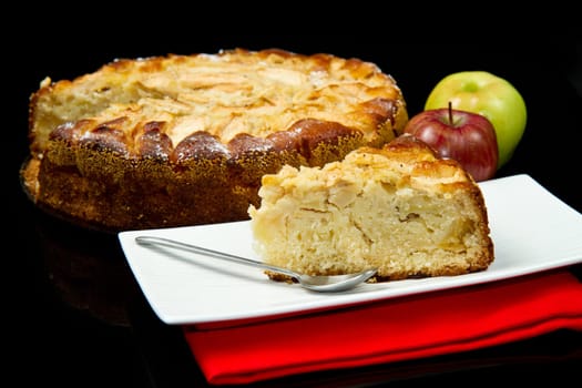 Apple Tart  with fresh apple on black background