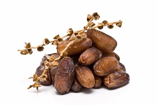 Date fruit isolated over a white background.