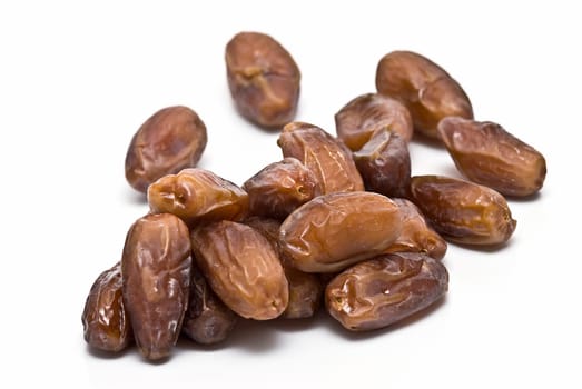 Date fruit isolated over a white background.