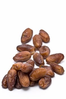 Date fruit isolated over a white background.