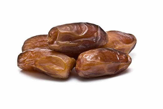 Date fruit isolated over a white background.