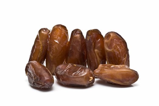 Date fruit isolated over a white background.