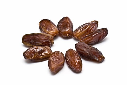 Date fruit isolated over a white background.
