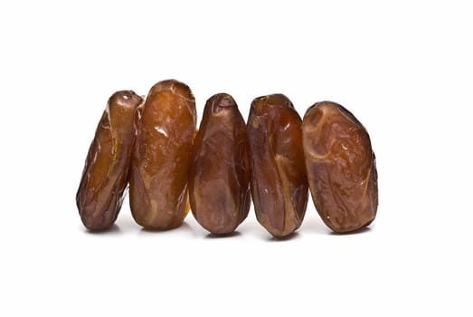 Date fruit isolated over a white background.