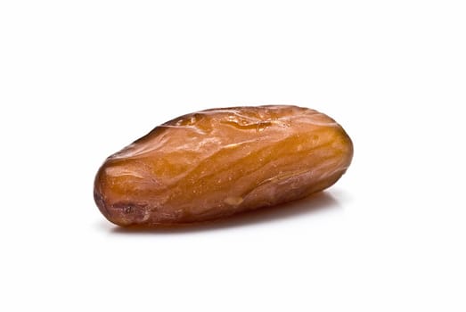 Date fruit isolated over a white background.