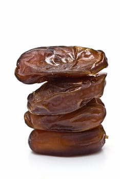 Date fruit isolated over a white background.