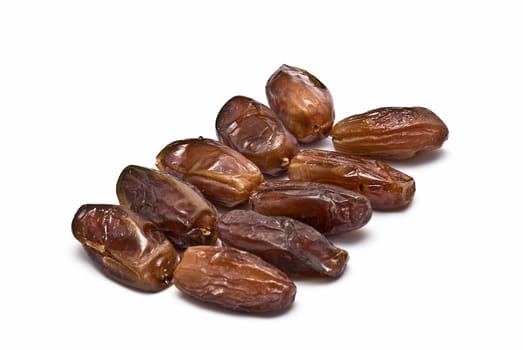 Date fruit isolated over a white background.