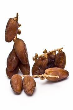 Date fruit isolated over a white background.