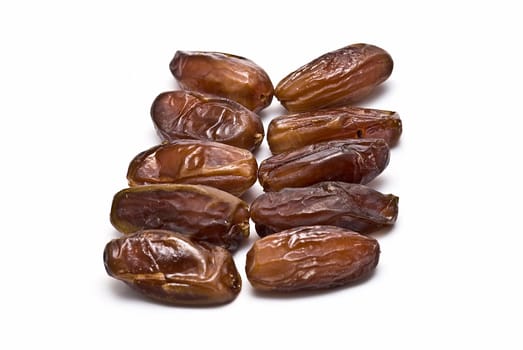 Date fruit isolated over a white background.