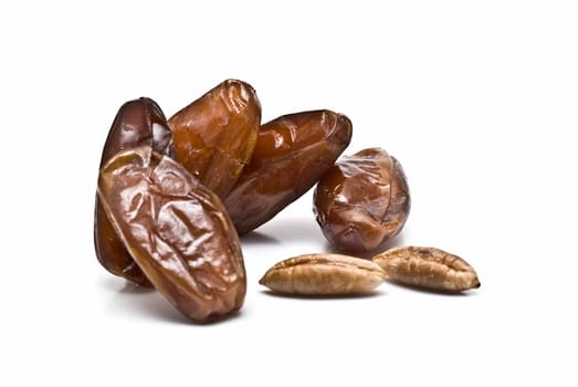 Date fruit isolated over a white background.