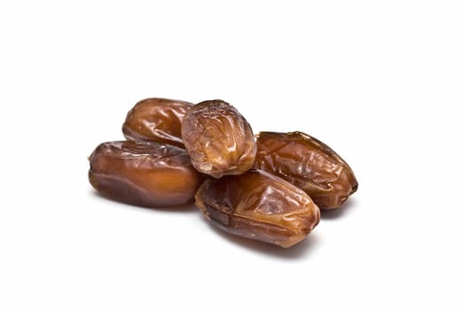 Date fruit isolated over a white background.