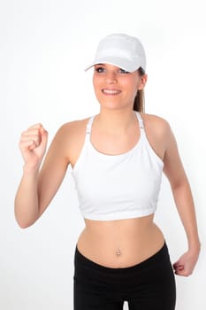 beautiful young woman running in a studio