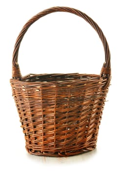 Empty wicker basket isolated on white