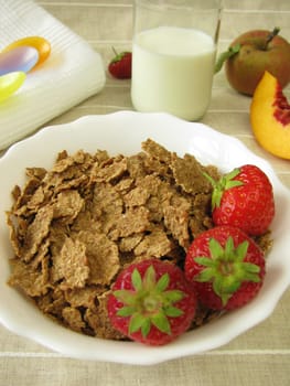 Children's breakfast with spelt flakes,milk and fruit
