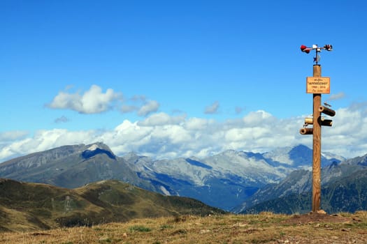 Wind turbine on a summit in South Tyrol's Passo Pens