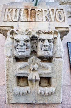 Characters from the Finnish national epos on a building facade in Helsinki.