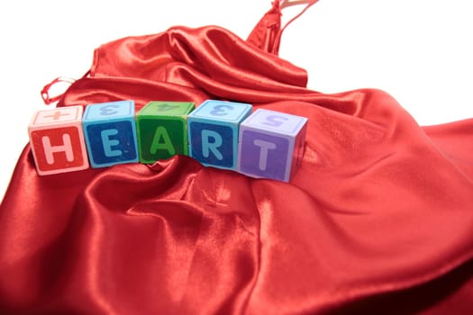 heart written with blocks on a silk nightie