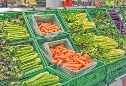 Vegetables at a supermarket, including carrots and celeries