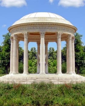 Classical circular temple in a garden