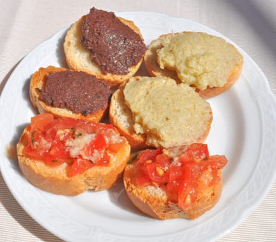 Traditional Italian bruschetta garlic bread with tomato top