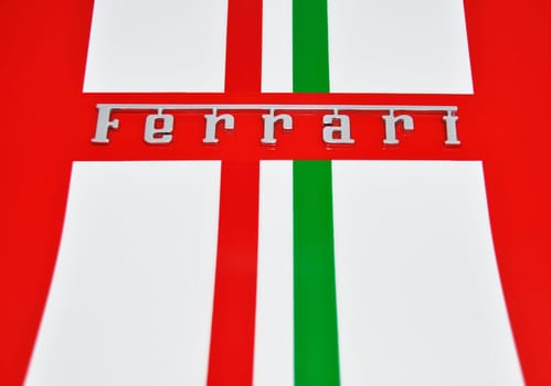 Ferrari sign and Italian flag stripes