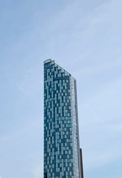 A Blue and Grey Angular Apartment Block