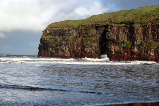 a view of the beach cliffs in ballybunion co kerry ireland on a stormy winter
