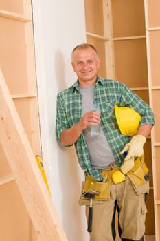 Handyman mature professional diy home improvement relax drink water