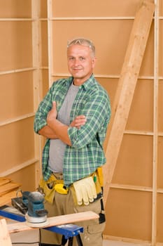 Handyman mature professional diy working on new home improvement