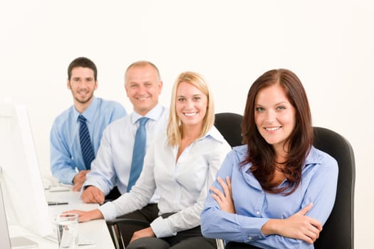 Business team attractive woman sit in line behind computer table