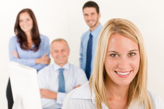 Business team close-up of pretty businesswoman with attractive happy colleagues