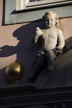 Angel on a house in Mühlhausen